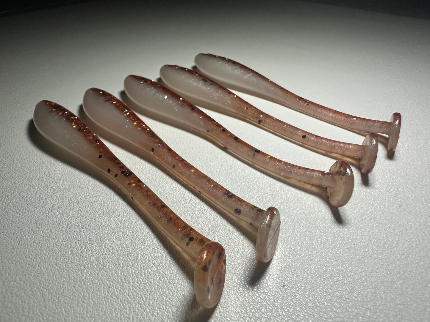 New Penny – 4.5” Dirty Shad Paddle Tail Soft Plastic (8-Pack)