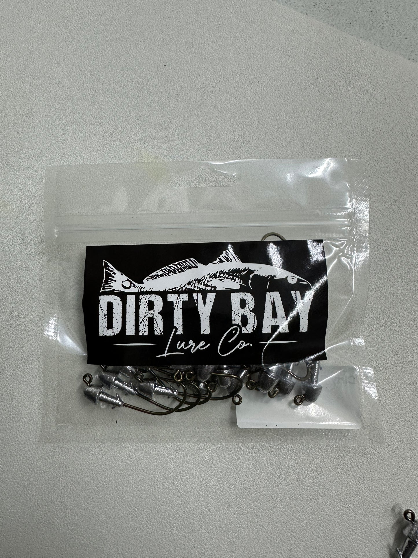 1/4 oz Premium Jig Heads 25 Pack – Strong Hook • Saltwater Ready • Dirty Bay Lure Company